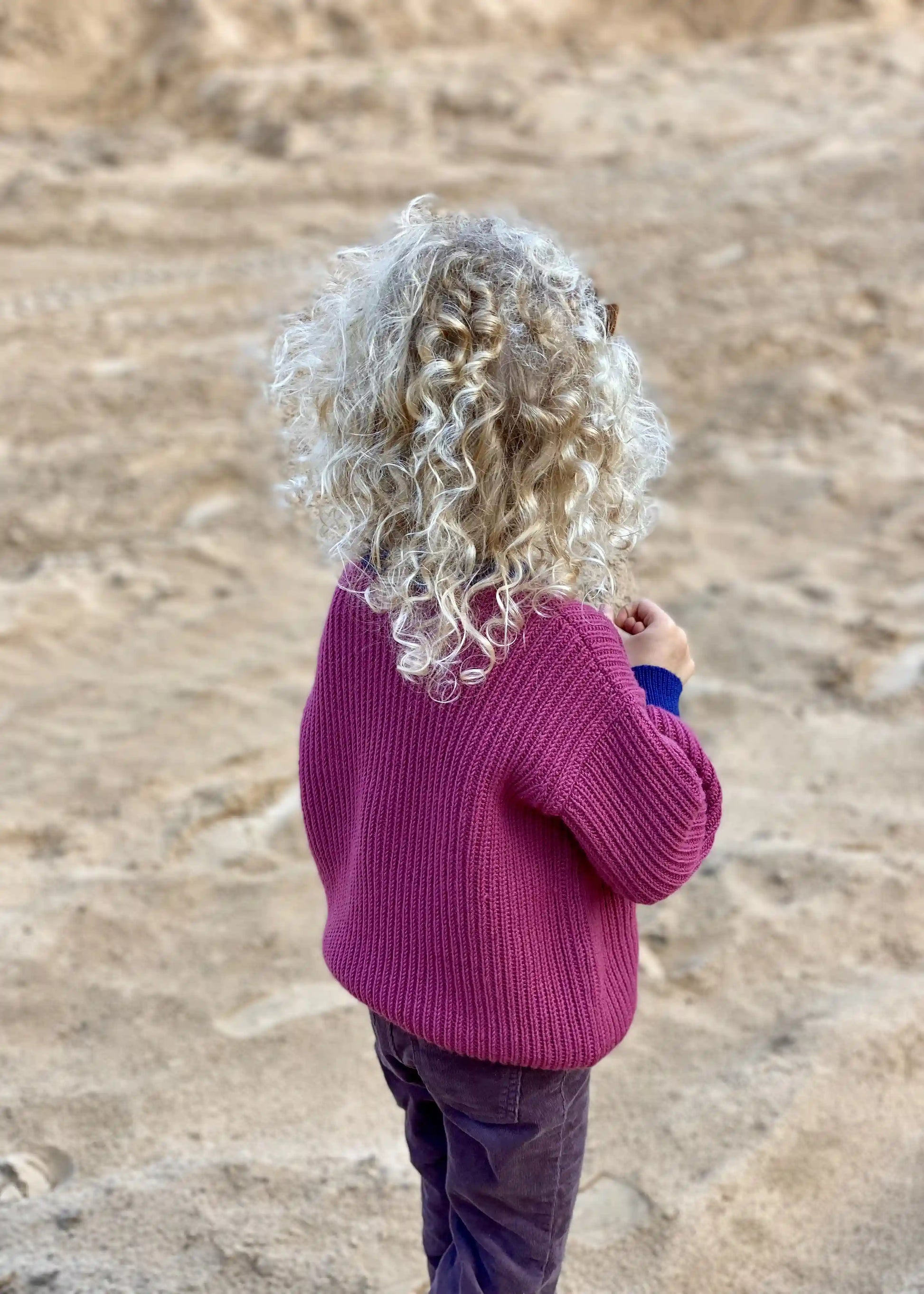 Vaikiskas vilnonis megztinis is nugaros